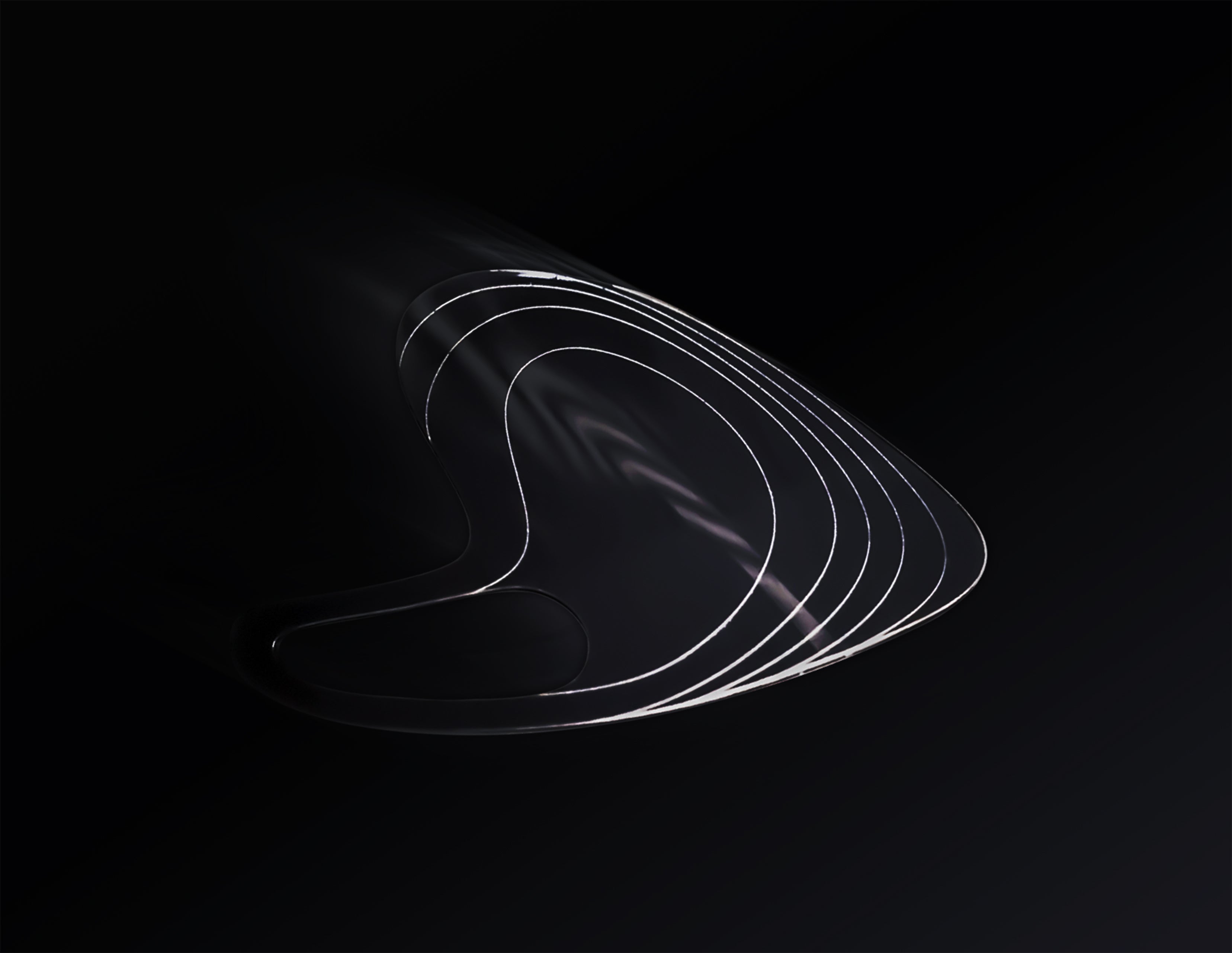 PRIMA in black against a dark background